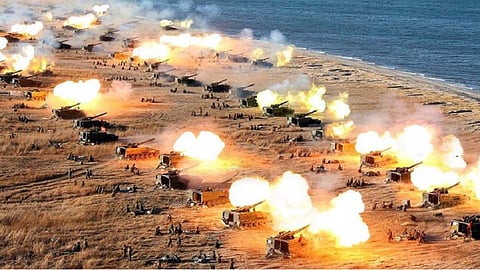 North Korea conducts artillery drills along disputed sea border. South Korea plans similar drills