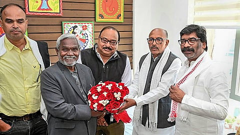 Jharkhand Chief Minister Champai Soren being greeted by former chief minister Hemant Soren after he won the floor test.