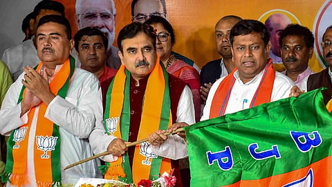 Former Calcutta High Court judge Justice Abhijit Gangopadhyay joins BJP in the presence of BJP WB President Sukanta Majumdar and Leader of Opposition in State Assembly Suvendu Adhikari, at BJP office, in Kolkata, Thursday, March 7, 2024.