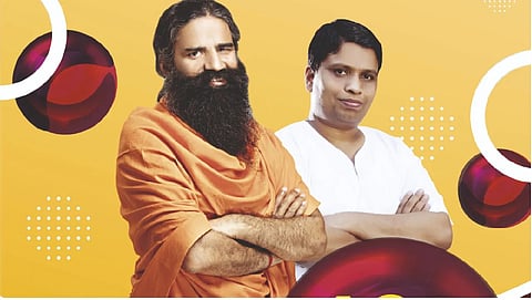 Ramdev (L), Balkrishna (R)