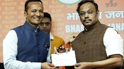 Former Congress MP Naveen Jindal joins BJP in the presence of party General Secretary Vinod Tawde, in New Delhi, Sunday, March 24, 2024.