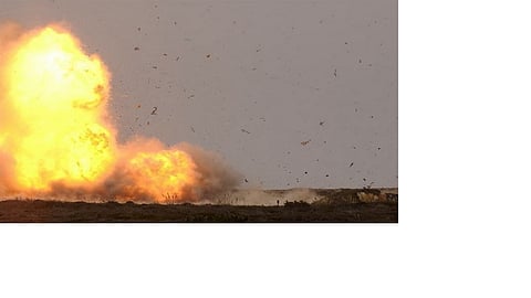 An old land mine found by children near an Afghanistan village explodes, killing 9