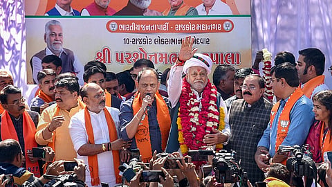Union Minister and BJP candidate for Lok Sabha elections Parshottam Rupala during a roadshow, in Rajkot, Tuesday, March 5, 2024.