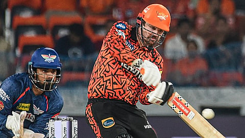 Sunrisers Hyderabad's Travis Head plays a shot during an Indian Premier League (IPL) 2024 T20 cricket match between Sunrisers Hyderabad and Lucknow Super Giants, at the Rajiv Gandhi International Stadium, Uppal, in Hyderabad, Wednesday, May 8, 2024.