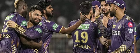 KKR trump Mumbai Indians by 18 runs, seal playoffs berth