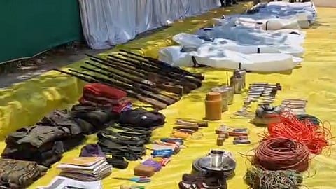 Arms and other items recovered by security personnel during an encounter with naxalites, in Bijapur district, Friday, May 10, 2024. At least 12 naxalites were killed, according to officials.