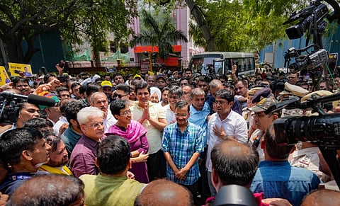 Delhi CM and AAP convenor Arvind Kejriwal with party leaders Atishi and Saurabh Bhardwaj during a protest march towards BJP HQ against the arrest of party leaders, in New Delhi, Sunday, May 19, 2024.
