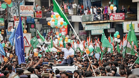 Congress leader Rahul Gandhi greets supporters during a roadshow amid his first visit to Kerala after the Lok Sabha election results, in Wayanad district.