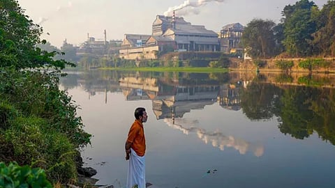The polluting factories along the river bed of Periyar