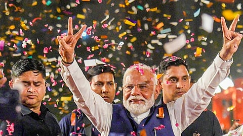 Prime Minister Narendra Modi greet supporters upon his arrival for a meeting at the party headquarters as the party leads in the Lok Sabha elections amid the counting of votes, in New Delhi, Tuesday, June 4, 2024.