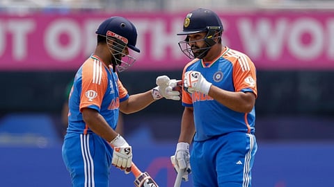 India's Rishabh Pant, left, is congratulated by his captain Rohit Sharma after playing a shot for four runs against Ireland during an ICC Men's T20 World Cup cricket match at the Nassau County International Cricket Stadium in Westbury, New York, Wednesday, June 5, 2024.