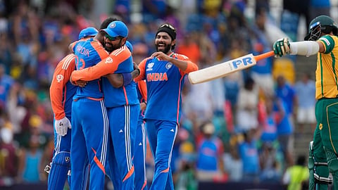 India's Hardik Pandya, second left, celebrates with teammates after the dismissal of South Africa's Kagiso Rabada during the ICC Men's T20 World Cup final cricket match between India and South Africa at Kensington Oval in Bridgetown, Barbados, Saturday, June 29, 2024.