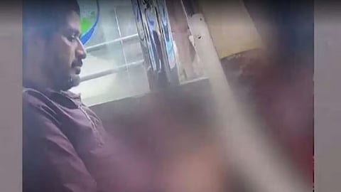 Flashing by a deaf and dumb man in a bus