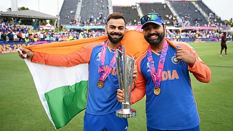 Kohli and Rohit holding T20 World Cup trophy.