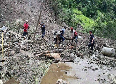 19 bodies recovered after landslide swept two buses into river in Nepal