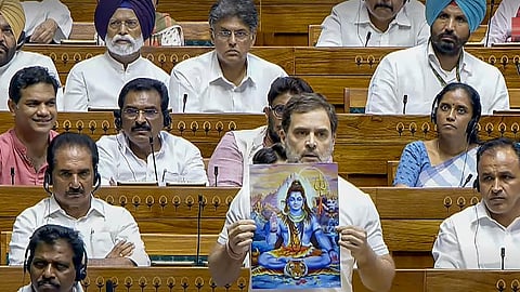 Leader of Opposition in Lok Sabha Rahul Gandhi holding up a pictures of Lord Shiva during his debut speech on July 1, 2024.