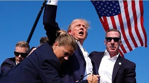 Trump being escorted out from the election rally in Pennsylvania