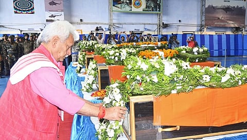 Jammu and Kashmir Lieutenant Governor Manoj Sinha pays last respect to the mortal remains of a matyr after four Army personnel were killed in an encounter with terrorists in Jammu and Kashmir's Doda district, in Jammu, Tuesday, July 16, 2024.