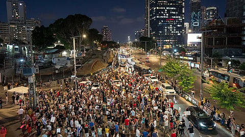 Relatives of hostages held by Hamas in the Gaza Strip and their supporters protest in Tel Aviv