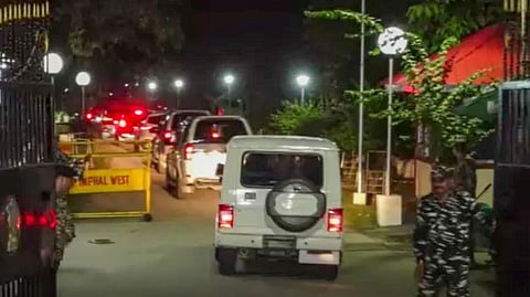 A convoy of Manipur Chief Minister N Biren Singh arrives at the Raj Bhavan to meet Governor Lakshman Acharya, in Imphal, Saturday, Sept. 7, 2024. Five people were killed in fresh violence in Manipur's Jiribam district on Saturday.