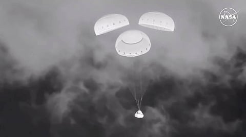 Boeing's troubled capsule returns to Earth empty, 2 astronauts left behind in space