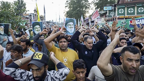 Kashmiri Shia Muslim protesters shout anti-Israeli and anti-U.S slogans during their protest march against the killing of Hezbollah leader Hassan Nasrallah in Israeli airstrikes in Beirut, Lebanon, at Magam in Budgam district of Central Kashmir.