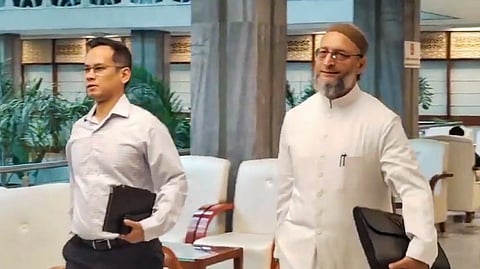 AIMIM MP Asaduddin Owaisi with Congress MP Gaurav Gogoi arrives for a Joint Parliamentary Committee meeting on the Waqf (Amendment) Bill 2024, in New Delhi, Monday, Oct. 14, 2024.