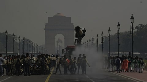 An anti-smog gun being used at the Kartavya Path to curb air pollution, near the India Gate, in New Delhi, Sunday, Oct. 27, 2024.