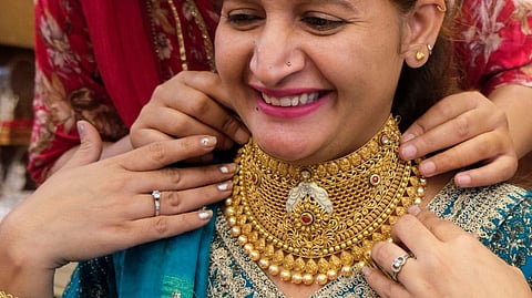 Gold climbs Rs 550 to Rs 99,300 per 10g, silver rallies Rs 1,170