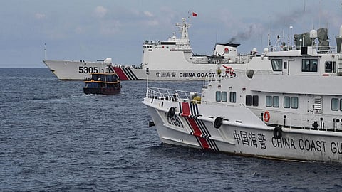 China is pushing Philippines 'to wall' with aggression in South China Sea, Manila says