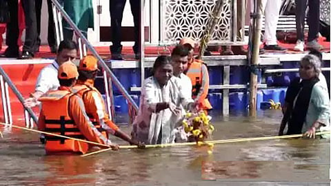 President Droupadi Murmu takes a holy dip at the Triveni Sangam.