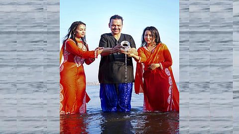 Holy dip by Maharashtra CM Devendra Fadnavis and his family
