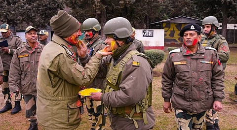 Border Security Force (BSF) personnel celebrate Holi