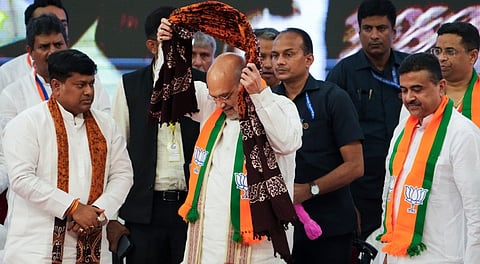 Union Home Minister Amit Shah, Union Minister of State for Development of North Eastern Region (DoNER) Sukanta Majumdar, Leader of Opposition in West Bengal Assembly Suvendu Adhikari and others during BJP's organisational meeting at Netaji Indoor Stadium, in Kolkata, West Bengal, Sunday, June 1, 2025.