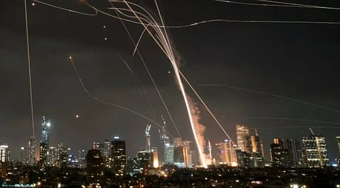 Israel and Iran launch new strikes even as diplomatic effort gets underway