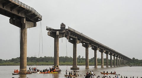 Rescue operation underway after several vehicles fell into the Mahisagar river when a portion of a four-decade-old bridge collapsed, in Gujarat's Vadodara district, Wednesday, July 9, 2025.