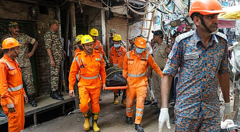 Rescue operation underway after a four-storey building collapsed at Janta Colony, at Welcome area in New Delhi, Saturday, July 12, 2025.