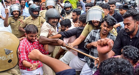 Police personnel lathicharge after clashes broke out between members of the Students Federation of India (SFI ) and the United Democratic Students' Front (UDSF) at the Kannur University, Kerala, Wednesday, Aug. 6, 2025.