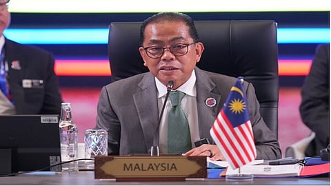 Urges ASEAN to expand defence cooperation in cyberspace