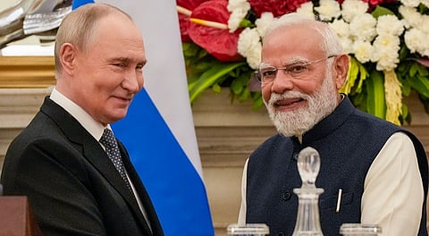 Prime Minister Narendra Modi with Russian President Vladimir Putin during a joint press statement after their meeting at the Hyderabad House, in New Delhi, Friday, Dec. 5, 2025.
