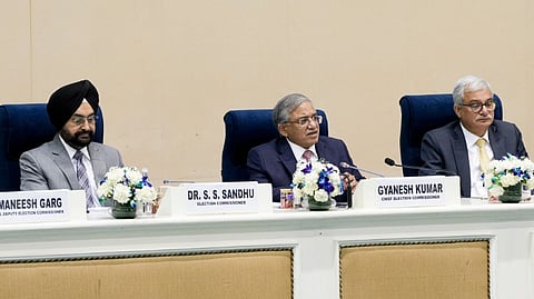 Chief Election Commissioner Gyanesh Kumar and election commissioners address a press conference regarding the Assembly election schedule in New Delhi, Sunday, March 15, 2026.
