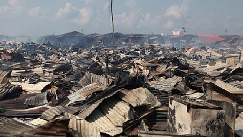 Fire destroys 1,000 homes in a Malaysian coastal village on Borneo Island