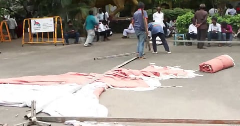 As DMK trails to third place, ''celebration'' tents dismantled at party headquarters