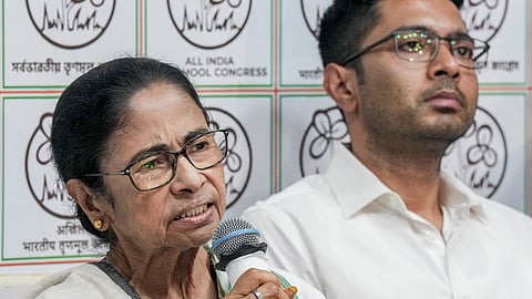 Outgoing West Bengal Chief Minister and TMC supremo Mamata Banerjee addresses a press conference, at her Kalighat residence in Kolkata, Tuesday, May 5, 2026. Party MP Abhishek Banerjee also seen.