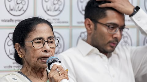 Outgoing West Bengal Chief Minister and TMC supremo Mamata Banerjee addresses a press conference, at her Kalighat residence in Kolkata, Tuesday, May 5, 2026. Party MP Abhishek Banerjee also seen.