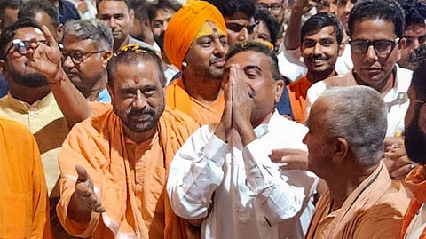 Newly-sworn West Bengal Chief Minister Suvendu Adhikari being welcomed upon his arrival at Bharat Sevashram Sangha, in Kolkata, Saturday, May 9, 2026.