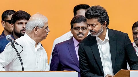 Governor Rajendra Arlekar intervenes to correct a flaw in Vijay's oath taking.