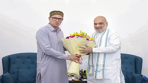 J-K CM calls on Amit Shah to discuss statehood, business rules for UT