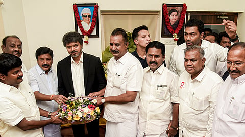 Tamil Nadu Chief Minister Vijay with AIDMK leaders CV Shanmugam, SP Velumani and others during a meeting, in Chennai, Tuesday, May 12, 2026.