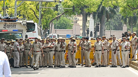 Police personnel present at the site during a protest staged by Indian Youth Congress (IYC) members against the National Testing Agency (NTA) over the alleged paper leak concerns following the cancellation of the NEET-UG 2026 examination, in New Delhi, Saturday, May 16, 2026.